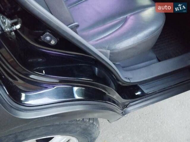 Чорний Хендай Туксон, об'ємом двигуна 1.99 л та пробігом 239 тис. км за 6990 $, фото 28 на Automoto.ua