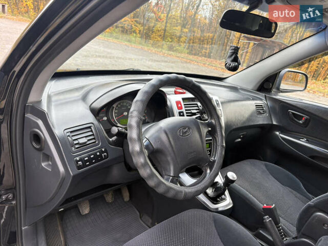 Хендай Туксон 2006 у Тернополі на Automoto.ua Чорний Хендай Туксон, об'ємом двигуна 1.99 л та пробігом 240 тис. км за 7600 $, фото 24 на Automoto.ua