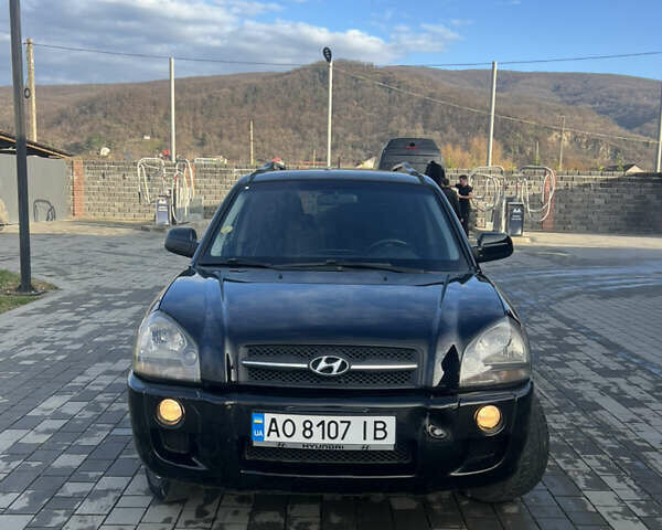 Черный Хендай Туксон, объемом двигателя 2 л и пробегом 355 тыс. км за 7000 $, фото 7 на Automoto.ua