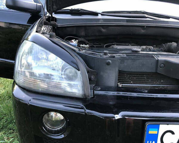 Хендай Туксон 2006 в Черкассах на Automoto.ua Черный Хендай Туксон, объемом двигателя 2 л и пробегом 190 тыс. км за 8000 $, фото 6 на Automoto.ua