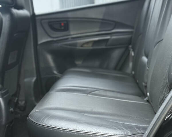 Черный Хендай Туксон, объемом двигателя 1.98 л и пробегом 231 тыс. км за 7750 $, фото 30 на Automoto.ua