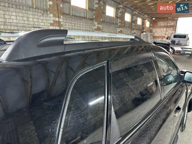 Чорний Хендай Туксон, об'ємом двигуна 2 л та пробігом 252 тис. км за 3000 $, фото 11 на Automoto.ua