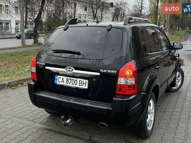 Черный Хендай Туксон, объемом двигателя 2 л и пробегом 242 тыс. км за 6999 $, фото 5 на Automoto.ua