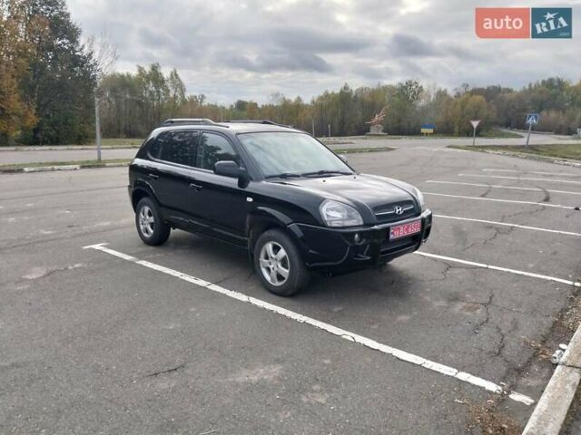 Черный Хендай Туксон, объемом двигателя 2 л и пробегом 127 тыс. км за 7590 $, фото 42 на Automoto.ua