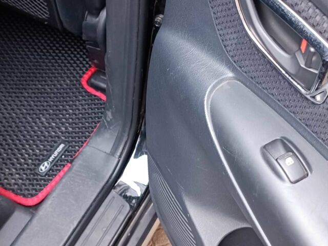 Черный Хендай Туксон, объемом двигателя 2 л и пробегом 124 тыс. км за 7200 $, фото 11 на Automoto.ua