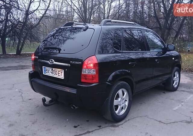 Черный Хендай Туксон, объемом двигателя 1.98 л и пробегом 320 тыс. км за 6300 $, фото 9 на Automoto.ua