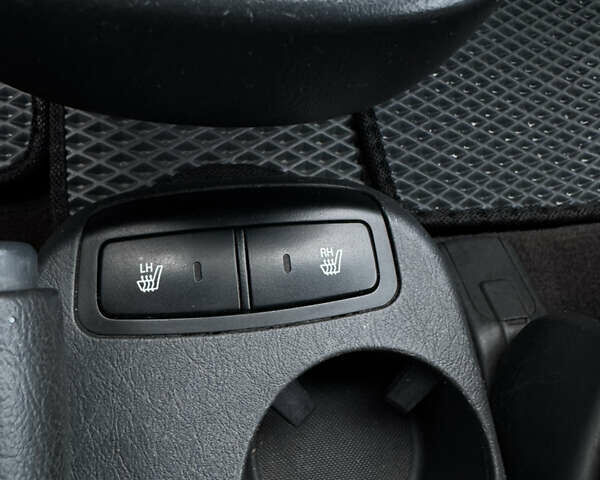 Черный Хендай Туксон, объемом двигателя 1.98 л и пробегом 198 тыс. км за 7500 $, фото 10 на Automoto.ua