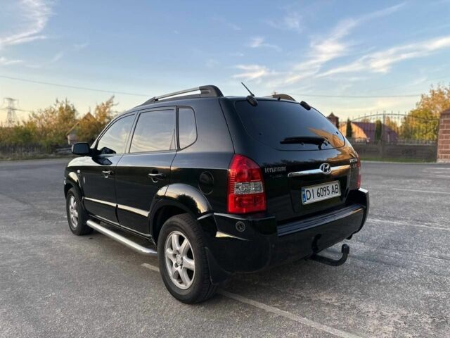 Чорний Хендай Туксон, об'ємом двигуна 2 л та пробігом 235 тис. км за 6700 $, фото 10 на Automoto.ua
