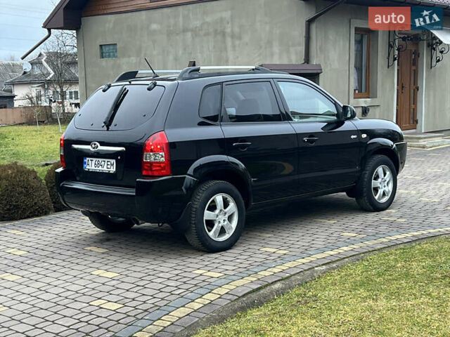 Чорний Хендай Туксон, об'ємом двигуна 1.98 л та пробігом 185 тис. км за 6850 $, фото 4 на Automoto.ua