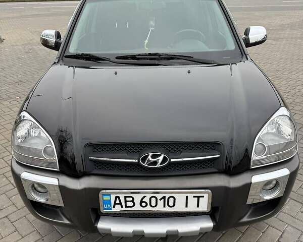 Чорний Хендай Туксон, об'ємом двигуна 2 л та пробігом 124 тис. км за 7950 $, фото 3 на Automoto.ua