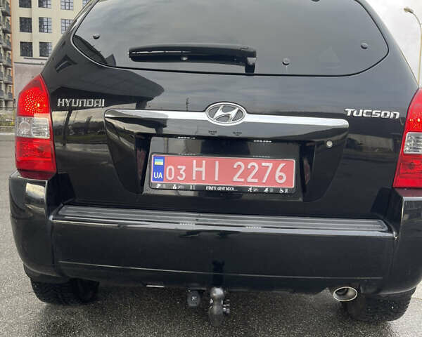 Черный Хендай Туксон, объемом двигателя 2 л и пробегом 194 тыс. км за 7250 $, фото 6 на Automoto.ua