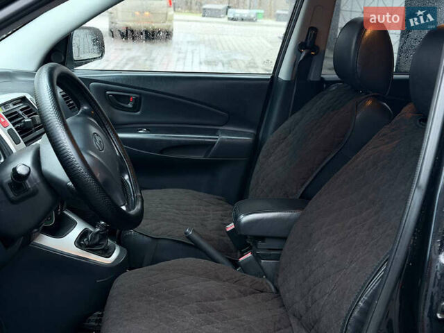 Чорний Хендай Туксон, об'ємом двигуна 1.99 л та пробігом 310 тис. км за 6399 $, фото 19 на Automoto.ua
