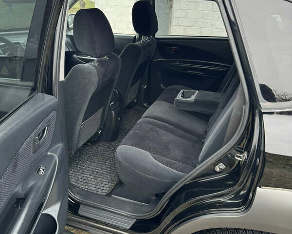 Черный Хендай Туксон, объемом двигателя 2 л и пробегом 201 тыс. км за 7750 $, фото 46 на Automoto.ua