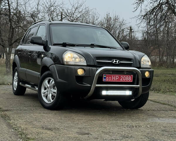 Черный Хендай Туксон, объемом двигателя 2 л и пробегом 201 тыс. км за 7750 $, фото 3 на Automoto.ua