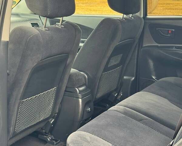 Черный Хендай Туксон, объемом двигателя 2 л и пробегом 209 тыс. км за 7600 $, фото 20 на Automoto.ua