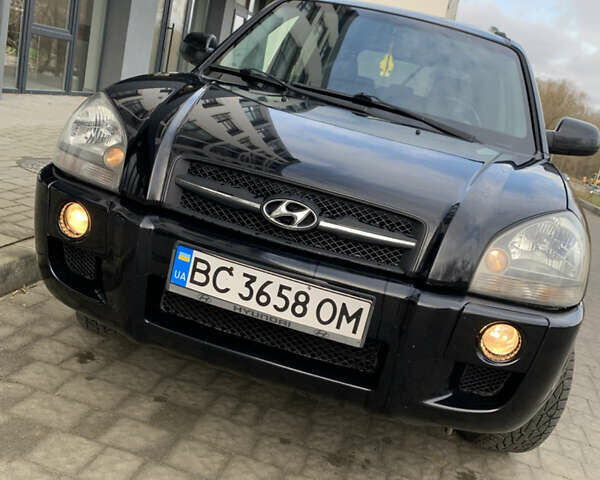 Черный Хендай Туксон, объемом двигателя 1.99 л и пробегом 290 тыс. км за 7700 $, фото 15 на Automoto.ua