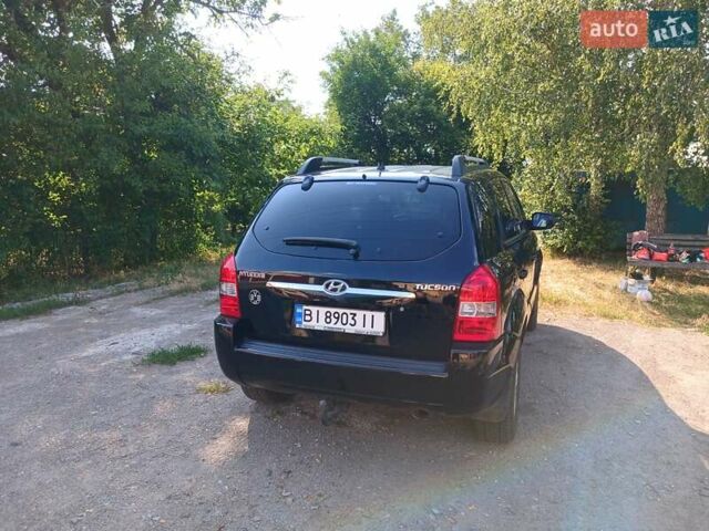 Чорний Хендай Туксон, об'ємом двигуна 1.98 л та пробігом 180 тис. км за 7600 $, фото 4 на Automoto.ua