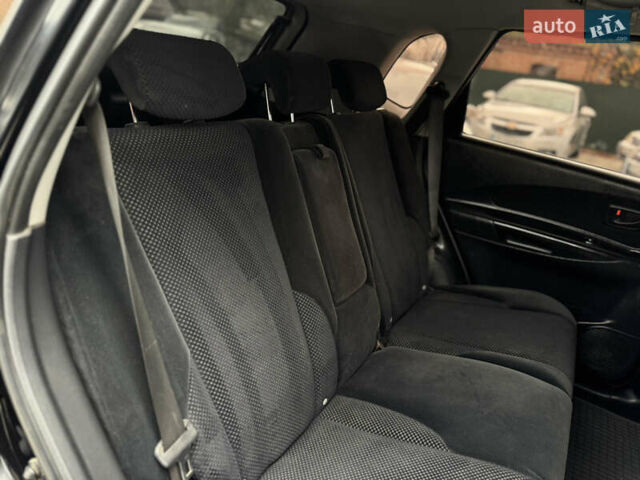 Чорний Хендай Туксон, об'ємом двигуна 2 л та пробігом 230 тис. км за 6999 $, фото 27 на Automoto.ua