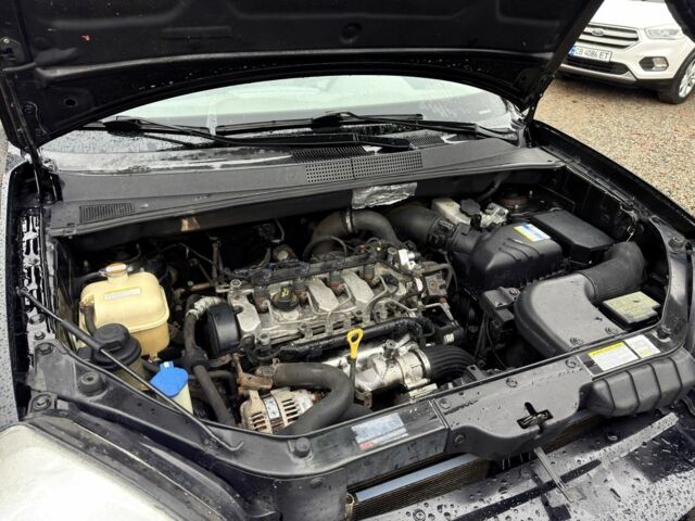 Черный Хендай Туксон, объемом двигателя 2 л и пробегом 263 тыс. км за 7950 $, фото 19 на Automoto.ua