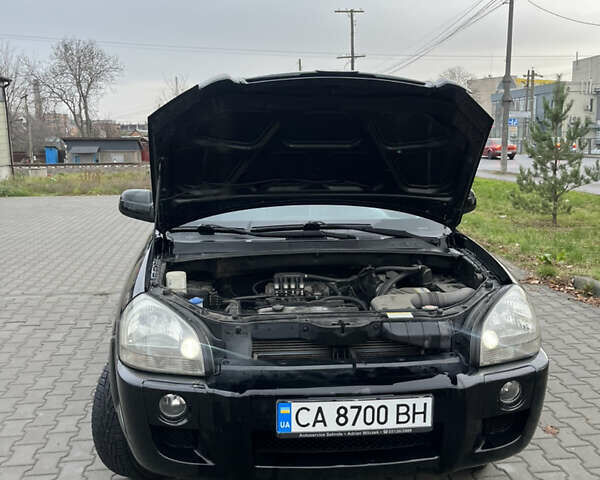 Черный Хендай Туксон, объемом двигателя 2 л и пробегом 242 тыс. км за 6999 $, фото 15 на Automoto.ua