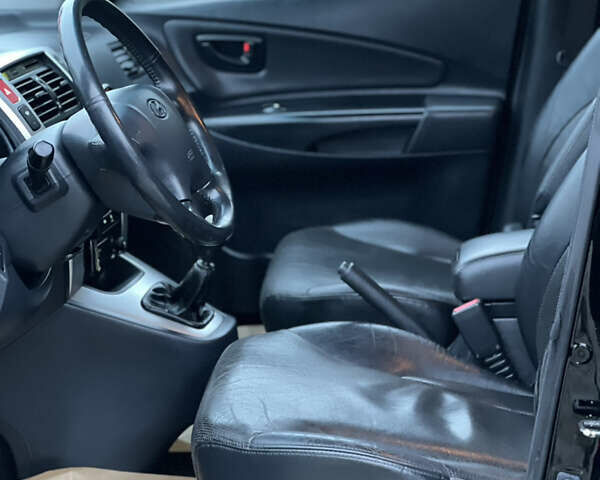 Чорний Хендай Туксон, об'ємом двигуна 1.98 л та пробігом 170 тис. км за 6999 $, фото 35 на Automoto.ua