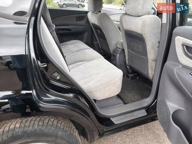 Черный Хендай Туксон, объемом двигателя 2 л и пробегом 216 тыс. км за 7600 $, фото 21 на Automoto.ua