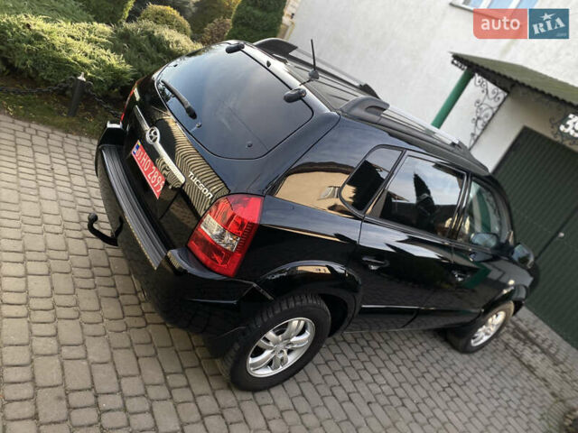 Чорний Хендай Туксон, об'ємом двигуна 1.98 л та пробігом 233 тис. км за 7650 $, фото 11 на Automoto.ua