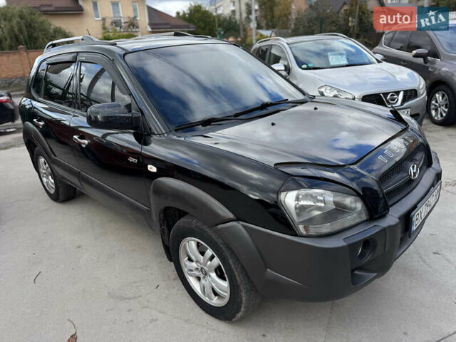 Чорний Хендай Туксон, об'ємом двигуна 2 л та пробігом 230 тис. км за 6999 $, фото 7 на Automoto.ua
