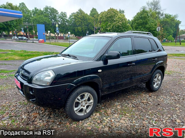 Черный Хендай Туксон, объемом двигателя 2 л и пробегом 130 тыс. км за 7200 $, фото 2 на Automoto.ua
