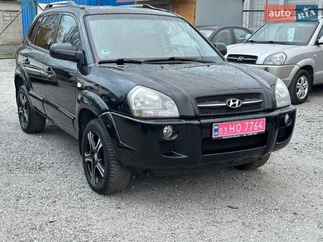 Чорний Хендай Туксон, об'ємом двигуна 2 л та пробігом 167 тис. км за 7950 $, фото 1 на Automoto.ua