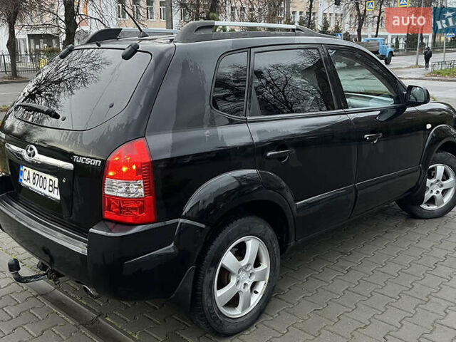 Черный Хендай Туксон, объемом двигателя 2 л и пробегом 242 тыс. км за 6999 $, фото 6 на Automoto.ua