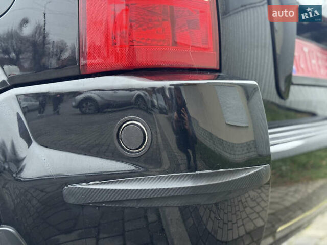 Черный Хендай Туксон, объемом двигателя 1.98 л и пробегом 231 тыс. км за 7750 $, фото 8 на Automoto.ua