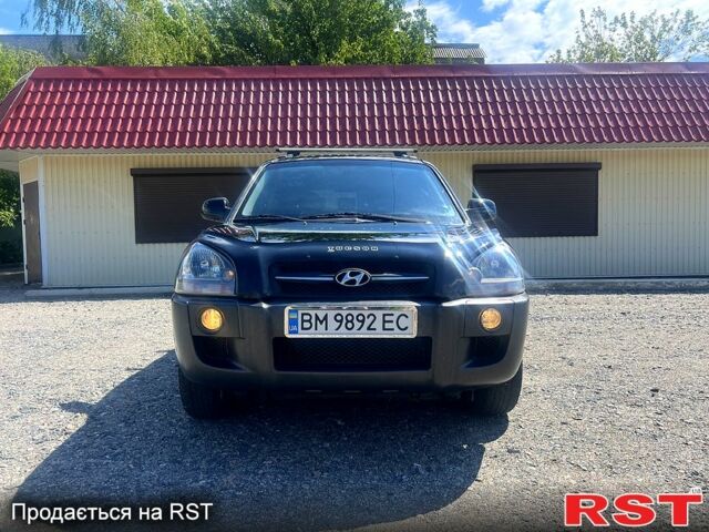 Чорний Хендай Туксон, об'ємом двигуна 2 л та пробігом 177 тис. км за 8800 $, фото 3 на Automoto.ua