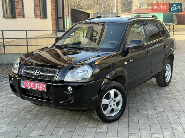 Черный Хендай Туксон, объемом двигателя 2 л и пробегом 249 тыс. км за 7450 $, фото 2 на Automoto.ua