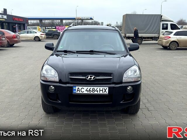 Черный Хендай Туксон, объемом двигателя 2 л и пробегом 200 тыс. км за 7800 $, фото 1 на Automoto.ua