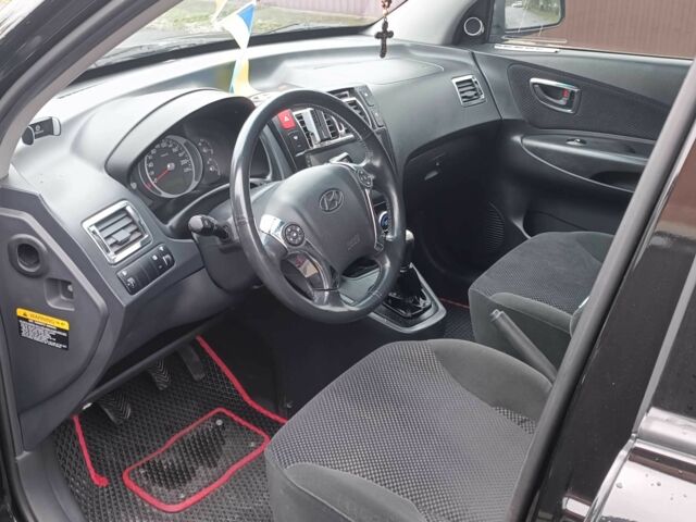 Черный Хендай Туксон, объемом двигателя 2 л и пробегом 124 тыс. км за 7200 $, фото 3 на Automoto.ua
