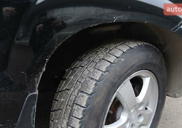 Чорний Хендай Туксон, об'ємом двигуна 1.98 л та пробігом 320 тис. км за 6500 $, фото 9 на Automoto.ua