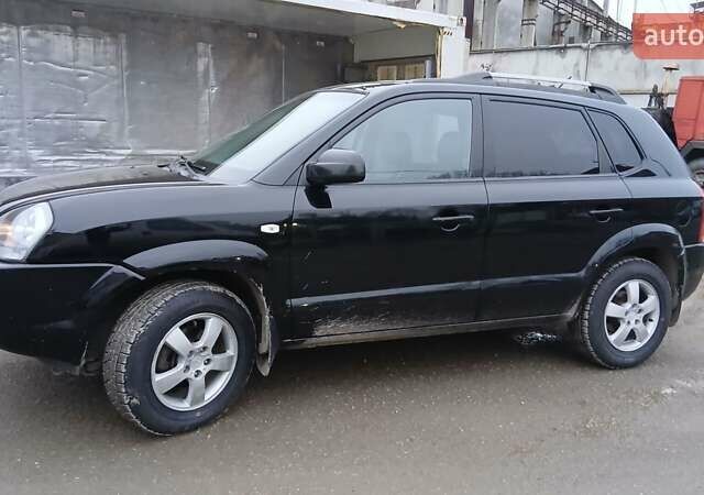 Чорний Хендай Туксон, об'ємом двигуна 1.98 л та пробігом 320 тис. км за 6500 $, фото 2 на Automoto.ua