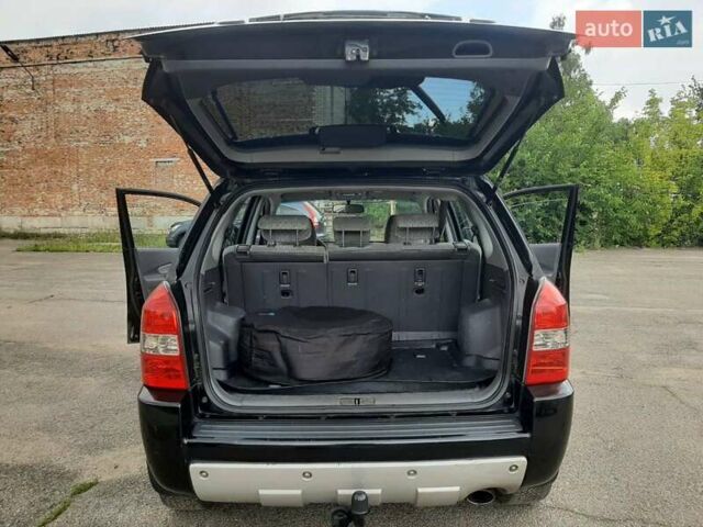 Черный Хендай Туксон, объемом двигателя 2 л и пробегом 216 тыс. км за 7600 $, фото 18 на Automoto.ua