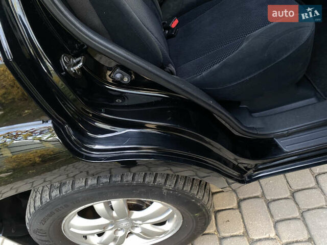 Чорний Хендай Туксон, об'ємом двигуна 1.98 л та пробігом 233 тис. км за 7650 $, фото 74 на Automoto.ua
