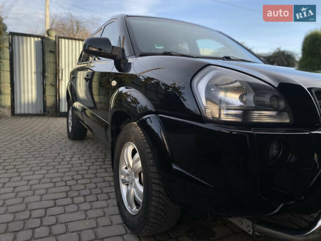 Чорний Хендай Туксон, об'ємом двигуна 1.98 л та пробігом 233 тис. км за 7650 $, фото 15 на Automoto.ua
