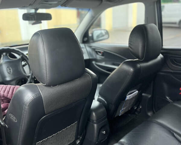 Черный Хендай Туксон, объемом двигателя 2 л и пробегом 242 тыс. км за 6999 $, фото 19 на Automoto.ua