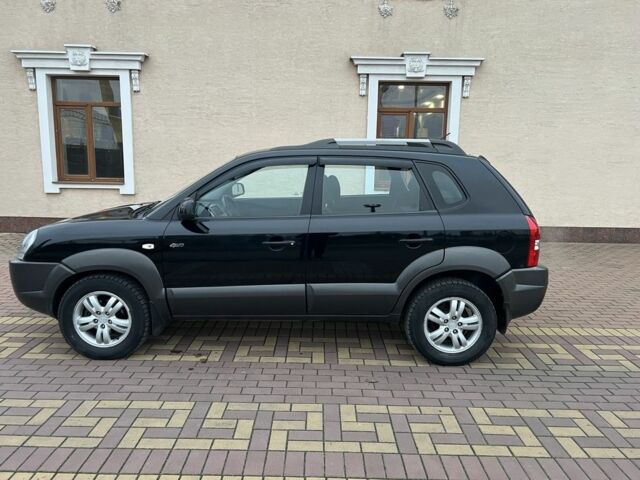 Черный Хендай Туксон, объемом двигателя 2 л и пробегом 220 тыс. км за 7200 $, фото 9 на Automoto.ua