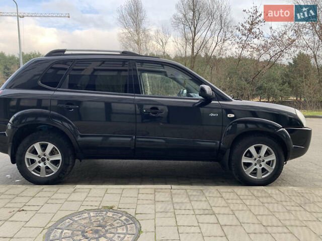 Черный Хендай Туксон, объемом двигателя 1.99 л и пробегом 290 тыс. км за 7700 $, фото 1 на Automoto.ua