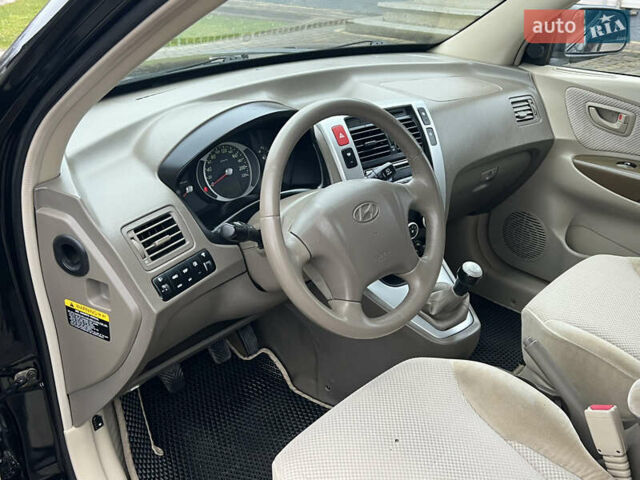 Чорний Хендай Туксон, об'ємом двигуна 1.98 л та пробігом 185 тис. км за 6850 $, фото 11 на Automoto.ua