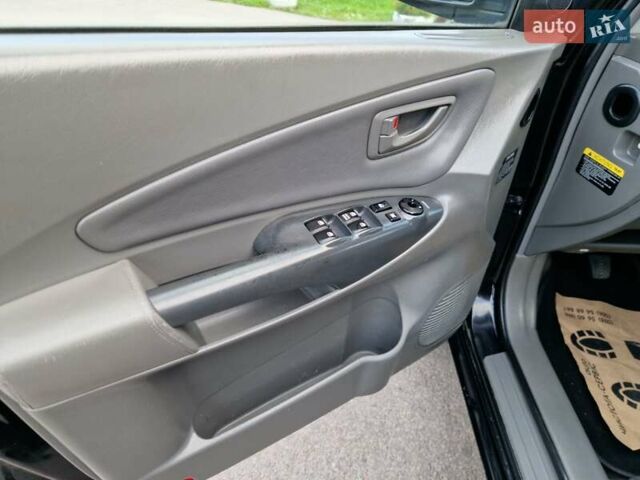 Черный Хендай Туксон, объемом двигателя 2 л и пробегом 215 тыс. км за 8850 $, фото 24 на Automoto.ua