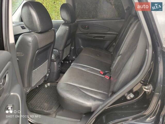 Черный Хендай Туксон, объемом двигателя 2 л и пробегом 237 тыс. км за 7999 $, фото 31 на Automoto.ua