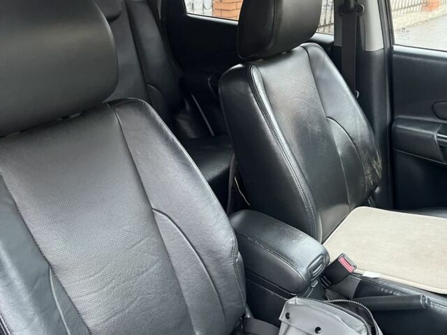 Черный Хендай Туксон, объемом двигателя 2 л и пробегом 242 тыс. км за 6999 $, фото 6 на Automoto.ua