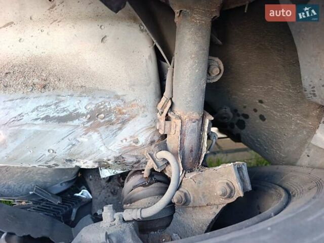 Черный Хендай Туксон, объемом двигателя 2.7 л и пробегом 275 тыс. км за 5500 $, фото 5 на Automoto.ua