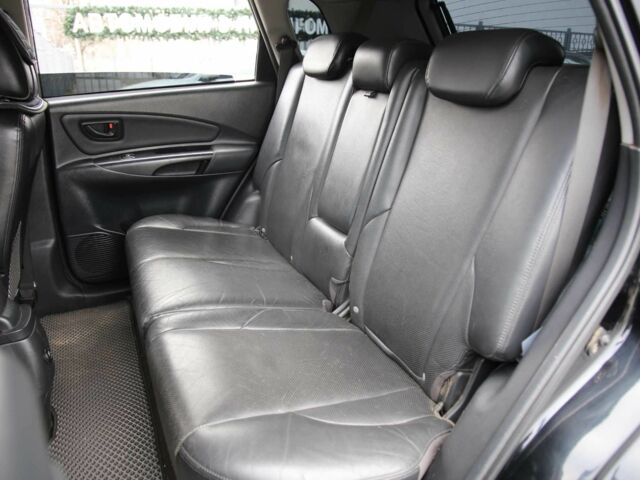 Черный Хендай Туксон, объемом двигателя 2.7 л и пробегом 217 тыс. км за 8600 $, фото 7 на Automoto.ua